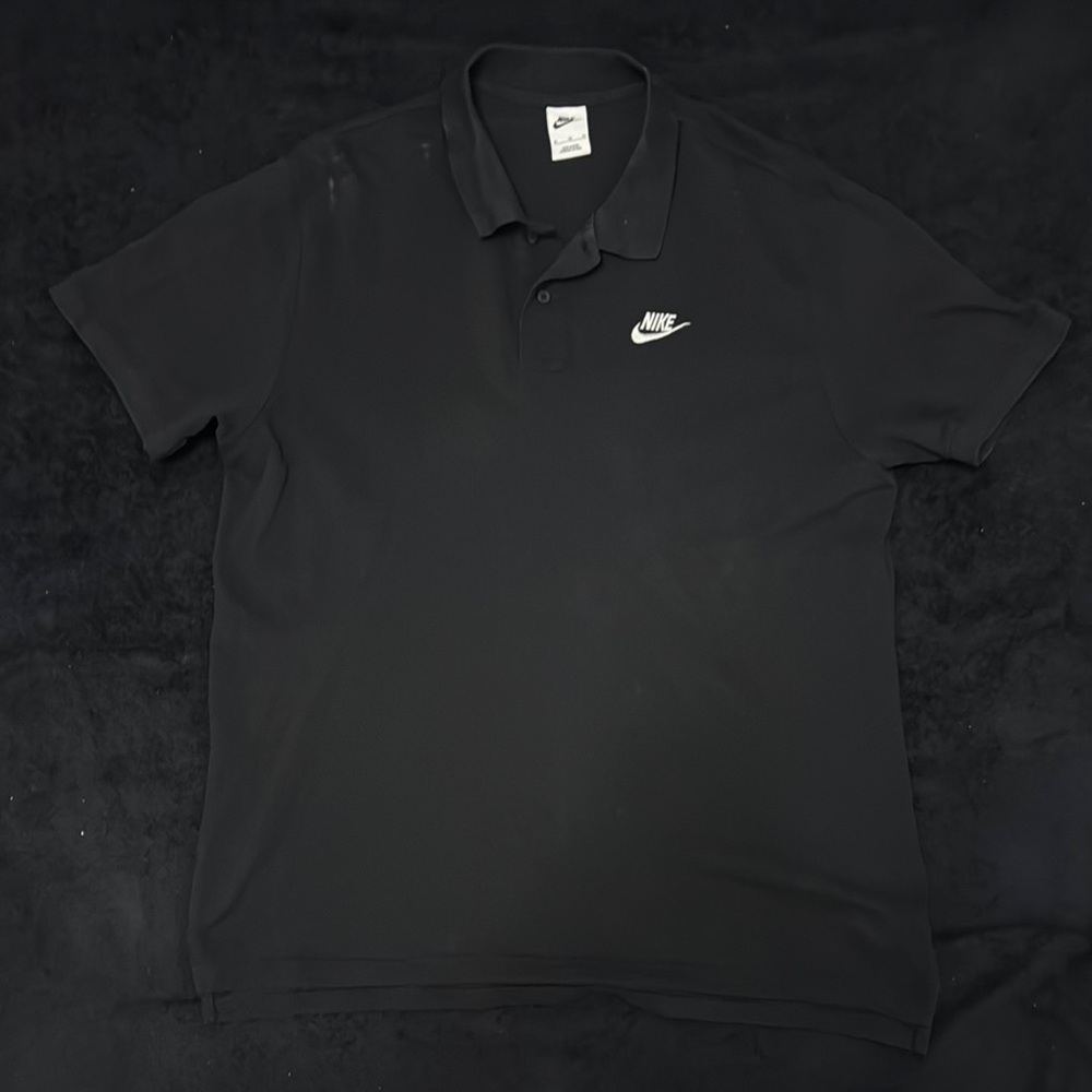 Nike Men's Black Polo with White Swoosh Logo